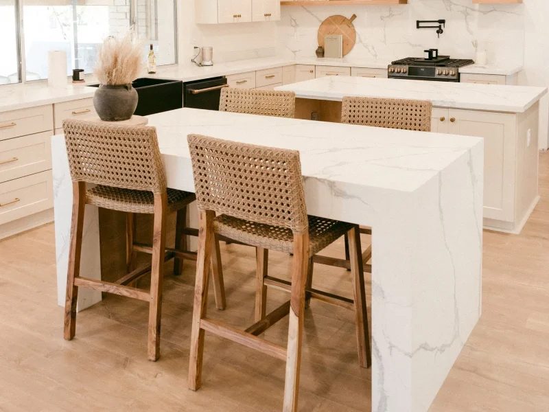 modern white kitchen with double cascade countertop islands